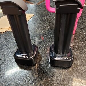 Theragun Black Charging Stands W/extra Batteries. Cords Included.